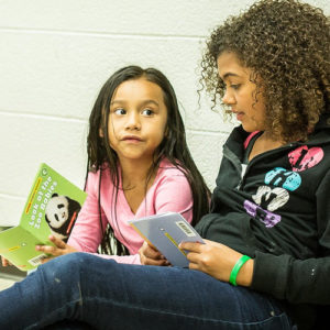 Girls reading at LaPlaza